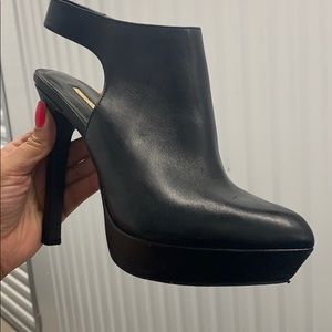 Black leather, back out booties with high heel